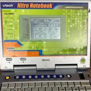 VTech Nitro Notebook Toy Laptop comes with power cord and story time cartridge